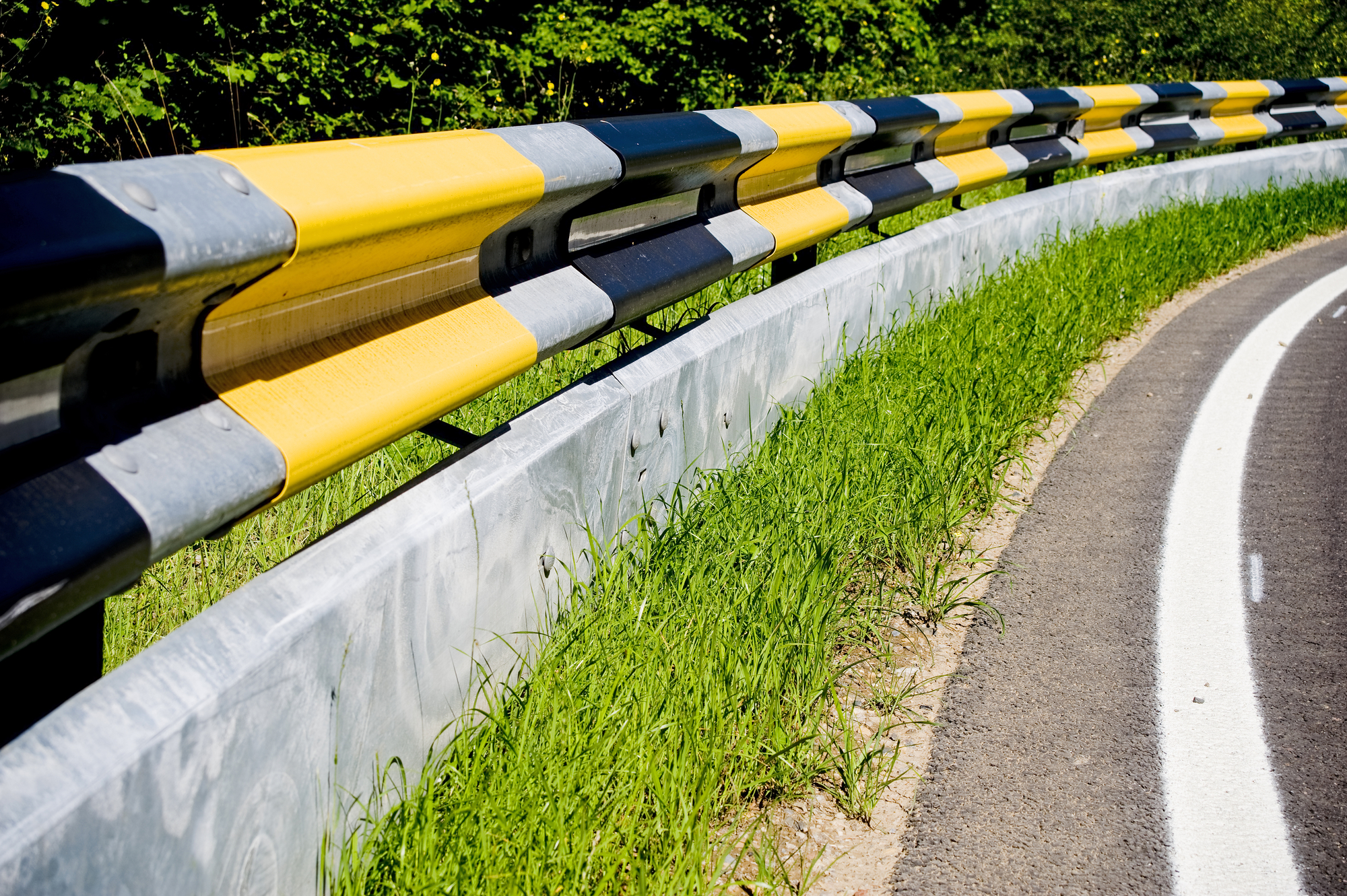 Advantages Of Defensive Driving & Safe Driving Tips - Guardrail with protection for motorcyclists